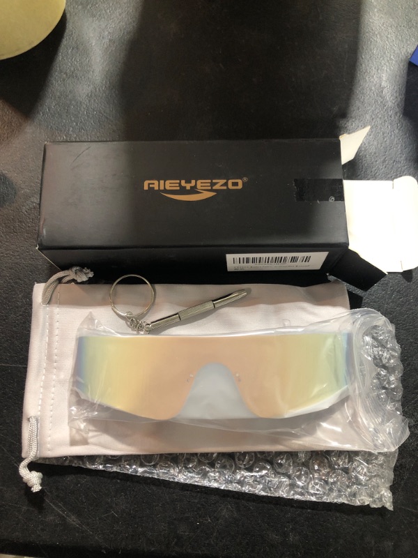 Photo 2 of AIEYEZO Modern Fashion Rimless Futuristic Wrap Around Sunglasses Women Men Cyberpunk Visor Sun Glasses Trendy Future Shades 