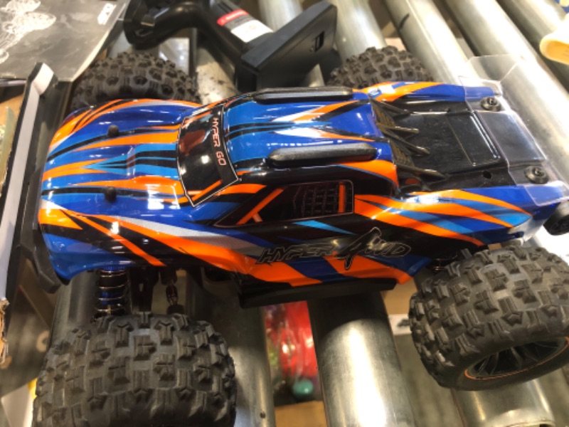 Photo 3 of **4*damage on the box*** HYPER GO H16DR 1:16 Scale Ready to Run Fast Remote Control Car, High Speed Jump RC Monster Truck, Off Road RC Cars, 4WD All Terrain RTR RC Truck with 2 LiPo Batteries for Boys and Adults