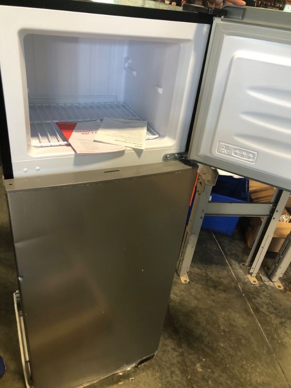 Photo 3 of ***Door Unhinged/ Screw Included***
Frigidaire EFR77O6COM, 2 Apartment Size Refrigerator with Freezer, 7.5 cu ft, Adjustable Spill-Proof Shelves, Door & Crisper Bins, Platinum Silver, Garage Ready, Quicksilver