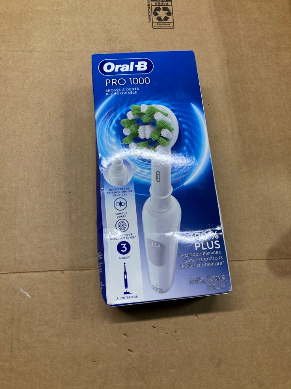 Photo 2 of ****USED** Oral-B Pro 1000 Rechargeable Electric Toothbrush, White White 1 Count (Pack of 1)