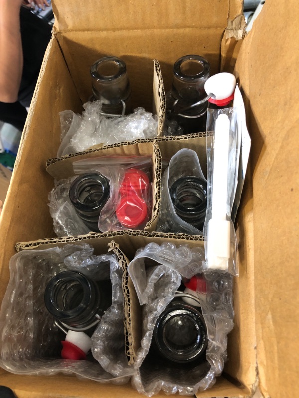 Photo 1 of Otis Classic Glass Bottles with Caps - Set of 6 Clear Swing Top Glass Bottles w/Ceramic Lids for Storing Kombucha, Liquor, Syrup, Wine, Kefir & Beer - Bonus Marker & Labels Included, 16oz