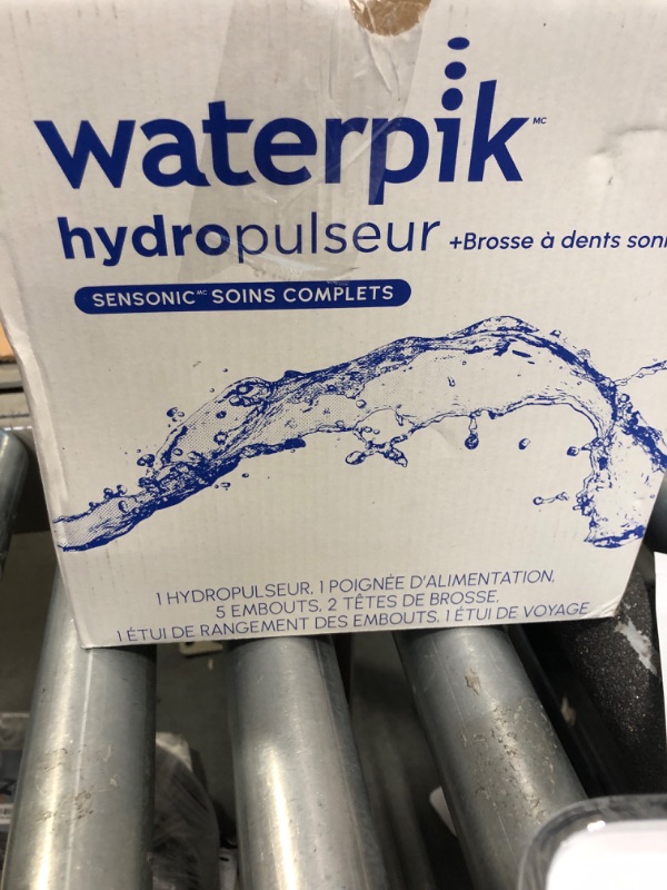 Photo 2 of ***Missing Water Tank*** Waterpik Sensonic Complete Care Water Flosser and Rechargeable Electric Toothbrush Combo Set, CC-04, White, Packaging May Vary