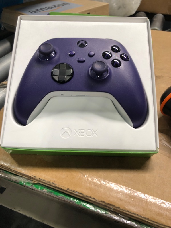 Photo 2 of ***MISSING CABLE***
Xbox Wireless Controller Astral Purple - Wireless and Bluetooth Connectivity - New Hybrid D-Pad - New Share Button - Featuring Textured Grip - Easily Pair and Switch Between Devices