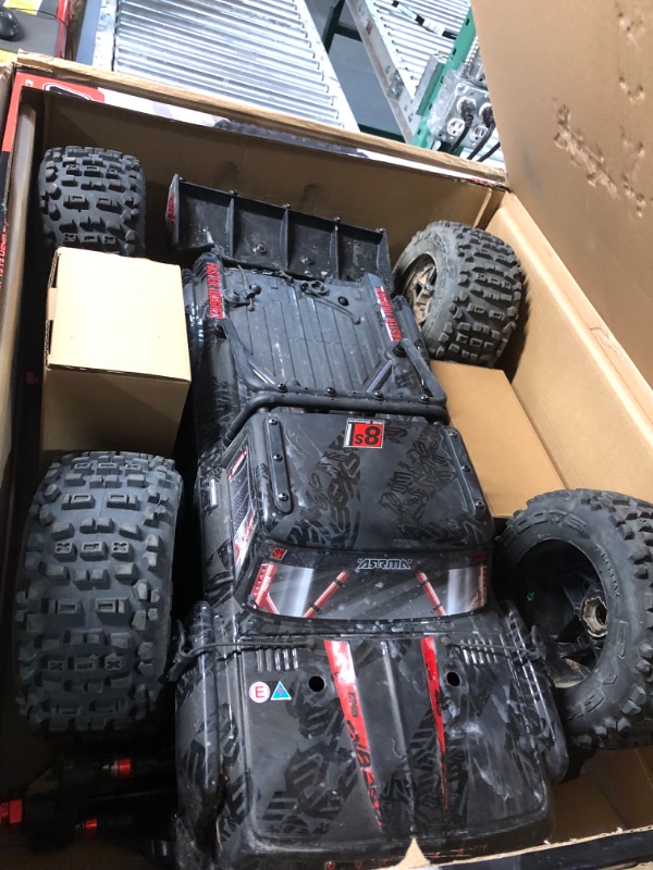 Photo 5 of ARRMA RC Truck Outcast 4X4 8S BLX 1/5 Stunt Truck Black RTR(Transmitter and Receiver Included, Battery and Charger Not Included) ARA5810V2T1