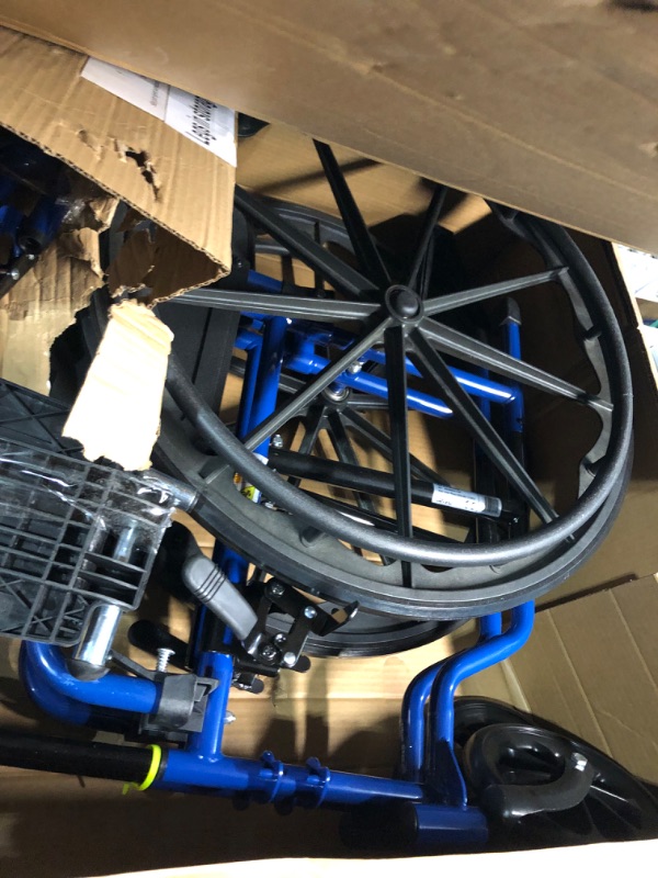 Photo 5 of ***USED - LIKELY MISSING PARTS - UNABLE TO VERIFY FUNCTIONALITY***
Blue Streak Wheelchair with Flip Back Desk Arms, 18 in. Seat and Swing Away Footrest