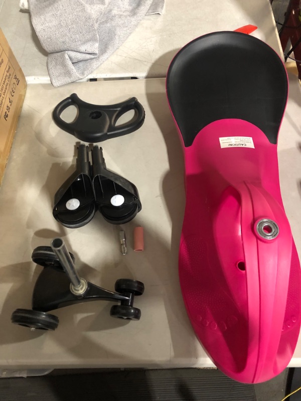 Photo 2 of ***MISSING HARDWARE*MINOR DAMAGE FROM WEAR*PICTURED***
Hey! Play! Zig Zag Ride On Car- No Batteries, Gears or Pedals- Twist, Wiggle &  (Pink)