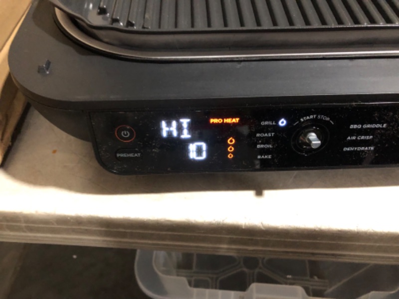 Photo 4 of ***USED - DAMAGED - UNTESTED - SEE COMMENTS***
Ninja IG601 Foodi XL 7-in-1 Electric Indoor Grill Combo, use Opened or Closed, Air Fry, Dehydrate & More, Pro Power Grate, Flat Top Griddle, Crisper, Black, 4 Quarts