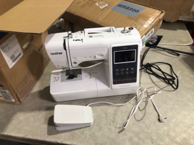 Photo 7 of ***DAMAGED - MISSING PARTS - SEE COMMENTS***
Brother SE700 Sewing and Embroidery Machine, Wireless LAN Connected, 135 Built-in Designs, 103 Built-in Stitches, Computerized, 4" x 4" Hoop Area, 3.7" Touchscreen Display, 8 Included Feet