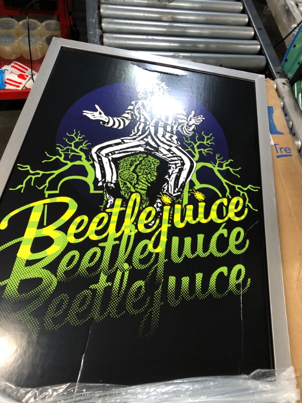 Photo 5 of **DAMAGE**Trends International Beetlejuice-Yellow and Green Neon Wall Poster, 22.375" x 34", Silver Framed Version 22.37" x 34.00" Silver Framed Version