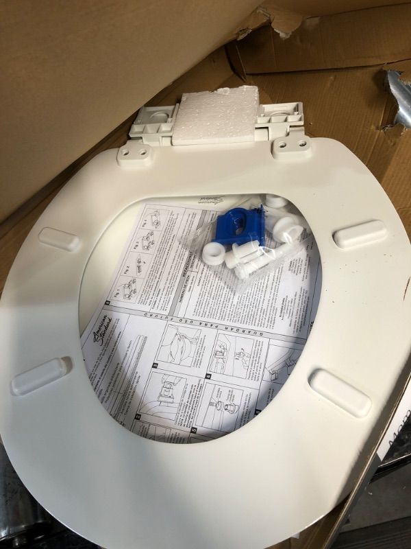 Photo 1 of **DAMAGE**  American Standard Moments Wood White Round Soft Close Toilet Seat
