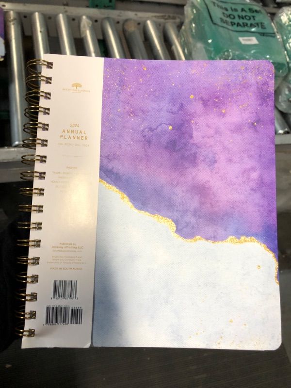 Photo 3 of 2024 Purple Annual Planner by Bright Day, Yearly Monthly Weekly Daily Spiral Bound Dated Agenda Flexible Cover Tabbed Notebook, 8.25 x 6.25