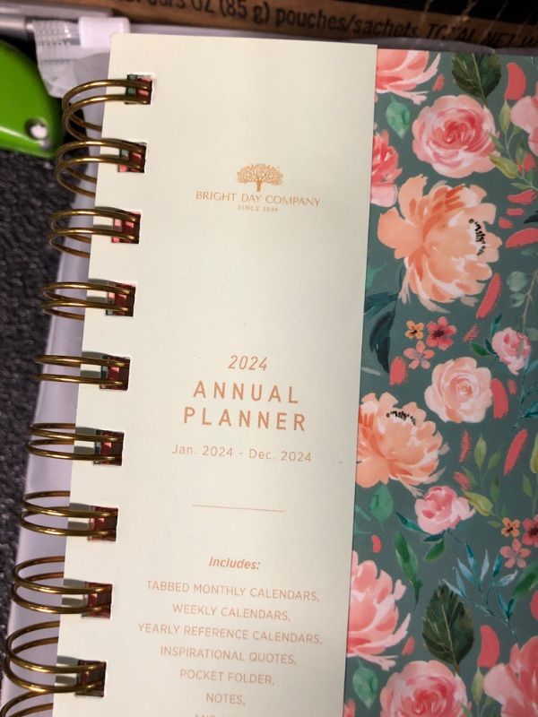 Photo 2 of 2024 Floral Annual Planner by Bright Day, Yearly Monthly Weekly Daily Spiral Bound Dated Agenda Flexible Cover Tabbed Notebook, 8.25 x 6.25