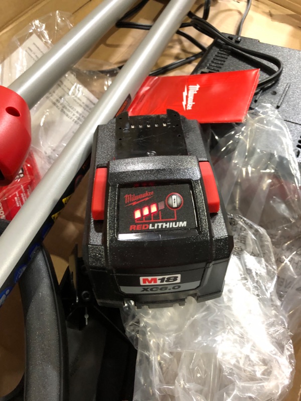 Photo 1 of **UNABLE TO TEST** Milwaukee M18 Brushless String Trimmer Kit w Battery and Charger 2828-21