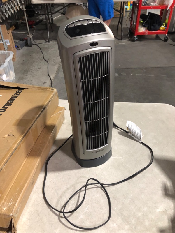 Photo 3 of ***NONREFUNDABLE - NOT FUNCTIONAL - FOR PARTS ONLY - SEE COMMENTS***
Lasko Oscillating Digital Ceramic Tower Heater for Home with Adjustable Thermostat, Timer and Remote Control, 23 Inches, 1500W, Silver, 755320