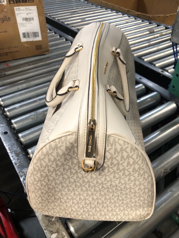 Photo 4 of **STOCK IMAGE IS A REFERENCE ONLY**  Michael Kors Travel Large Duffle Bag in PVC Signature (WHITE)