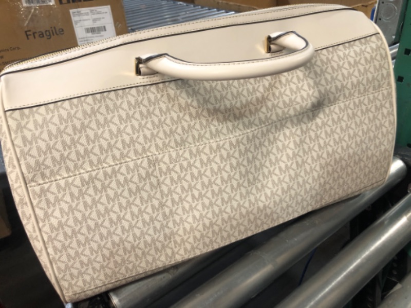 Photo 3 of **STOCK IMAGE IS A REFERENCE ONLY**  Michael Kors Travel Large Duffle Bag in PVC Signature (WHITE)