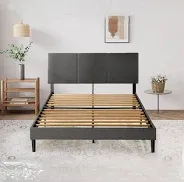 Photo 1 of Upholstered Bed Frame ***MISSING HEAD BOARD AND BED PLATFORM*****