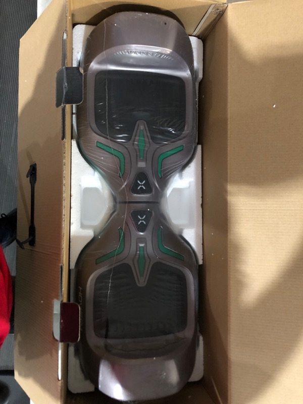 Photo 2 of Hover-1 Electric Self-Balancing Hoverboard with 6.5” Tires, Dual 200W Motors, 7 MPH Max Speed, and 6 Miles Max Range (GREY/GREEN) FOR RIDERS UP TO 220LBS