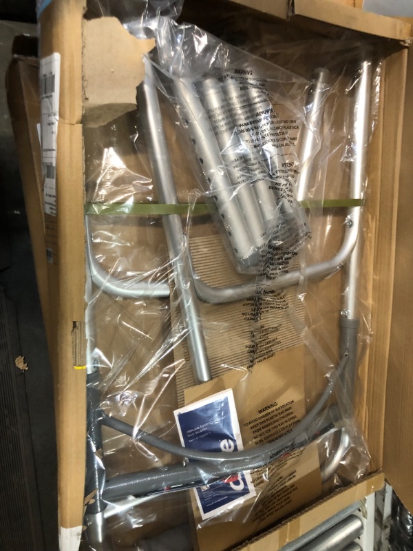 Photo 1 of Drive Medical 10200-1 Deluxe 2-Button Folding Walker, Silver