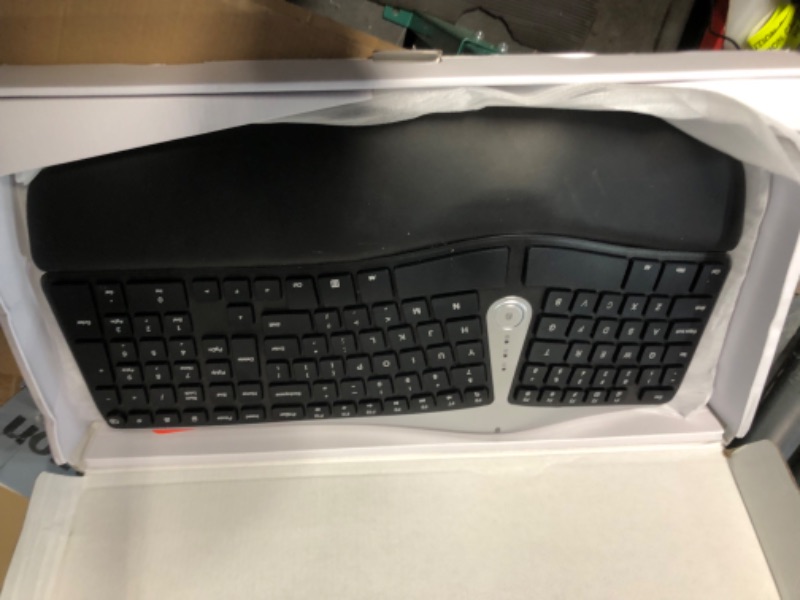 Photo 1 of Arteck Split Ergonomic Keyboard with Cushioned Wrist and Palm Rest, 2.4G USB Wireless Comfortable Natural Ergonomic Split Keyboard, for Windows Computer Desktop Laptop