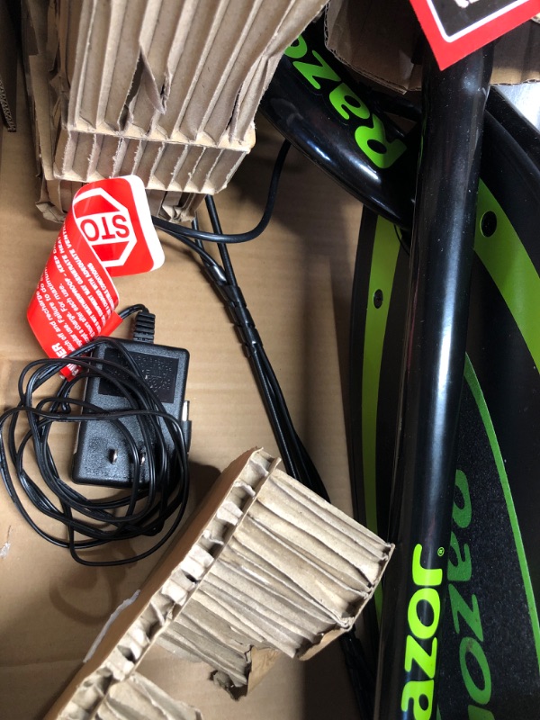 Photo 4 of Razor Power Core E90 Electric Scooter - Hub Motor, Up to 10 mph and 80 min Ride Time, for Kids 8 and Up Green Standard Packaging