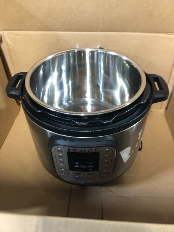 Photo 2 of **minor dent-missing lid and power cord**
Instant Pot Duo 7-in-1 Electric Stainless Steel, 6 Quart 6QT Duo Pressure Cooker