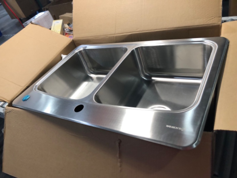 Photo 4 of ***USED - LIKELY MISSING PARTS - UNABLE TO VERIFY FUNCTIONALITY***
33 in. Drop-in 50/50 Double Bowl 20 Gauge Stainless Steel Kitchen Sink with Pull-Out Faucet
