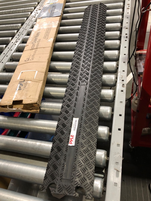 Photo 2 of Durable Cable Protection Ramp Cover - Supports 11000lbs Single Channel Heavy Duty Hose and Cord Track Floor Protection, 39.4” x 5.11” x 0.78” Cable Concealer for Indoor Outdoor Use - Pyle PCBLCO101BK