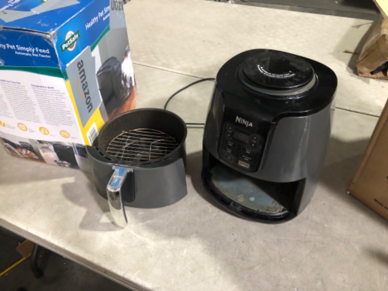 Photo 6 of ***HEAVILY USED AND DIRTY - SEE PICTURES - POWERS ON - UNABLE TO TEST FURTHER***
Ninja AF101 Air Fryer that Crisps, Roasts, Reheats, & Dehydrates, for Quick, Easy Meals, 4 Quart Capacity, & High Gloss Finish, Black/Grey 4 Quarts