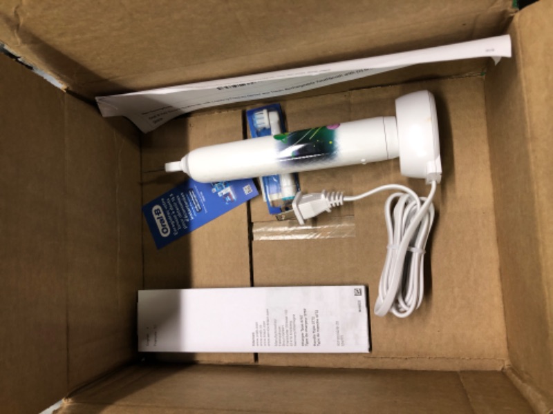 Photo 3 of ** new open package**
Oral-B Kids Electric Toothbrush with Coaching Pressure Sensor and Timer, Rechargeable Toothbrush with (2) Brush Heads, Sparkle & Shine