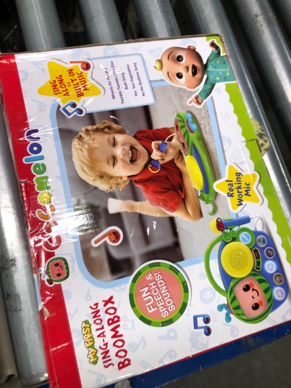Photo 1 of eKids Auxiliary Cocomelon Toy Singalong Boombox with Microphone for Toddlers, Built-in Music and Flashing Lights, Fans of Cocomelon Gifts