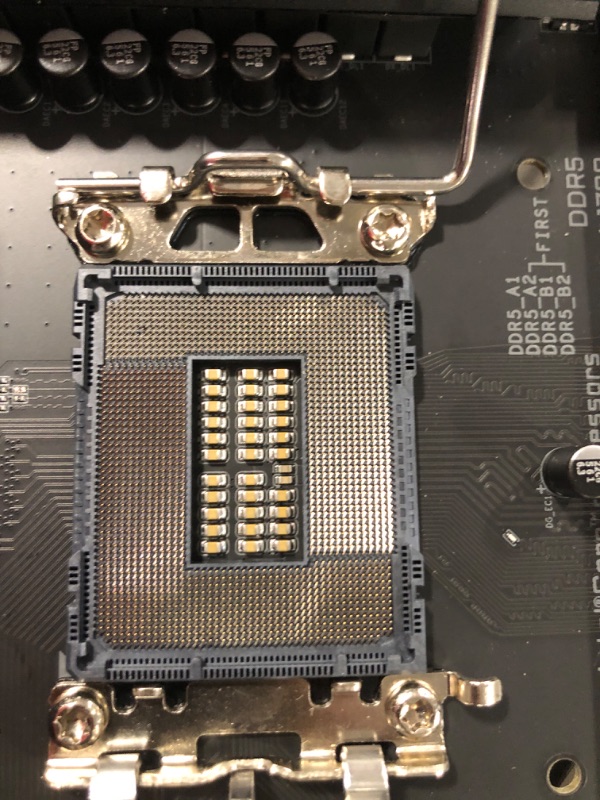 Photo 3 of **DAMAGED CPU SOCKET** SOLD FOR PARTS ONLY** GIGABYTE Z790 AORUS Elite AX (LGA 1700/ Intel Z790/ ATX/ DDR5/ Quad M.2/ PCIe 5.0/ USB 3.2 Gen2X2 Type-C/Intel WiFi 6E/ 2.5GbE LAN/Q-Flash Plus/PCIe EZ-Latch/Gaming Motherboard)
