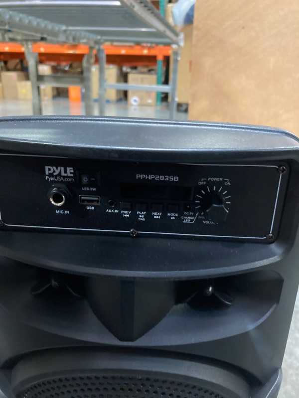 Photo 4 of ****MISSING CHARGER AND REMOTE//NON FUNCTIONAL SOLD AS PARTS**** 
Pyle Portable Bluetooth PA Speaker System - 600W Rechargeable Outdoor Bluetooth Speaker Portable PA System w/ Dual 8” Subwoofer 1” Tweeter, Microphone In, Party Lights, USB, Radio, Remote -