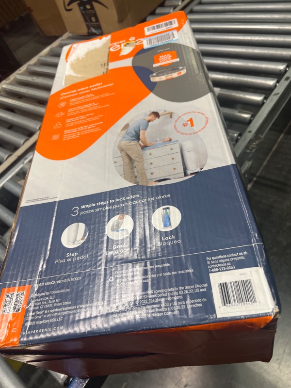 Photo 1 of Diaper Genie Complete Diaper Pail (Blue) with Antimicrobial Odor Control | Includes 1 Diaper Trash Can, 1 Refill Bags, 1 Carbon Filter Blue Pail + 1 Refill
