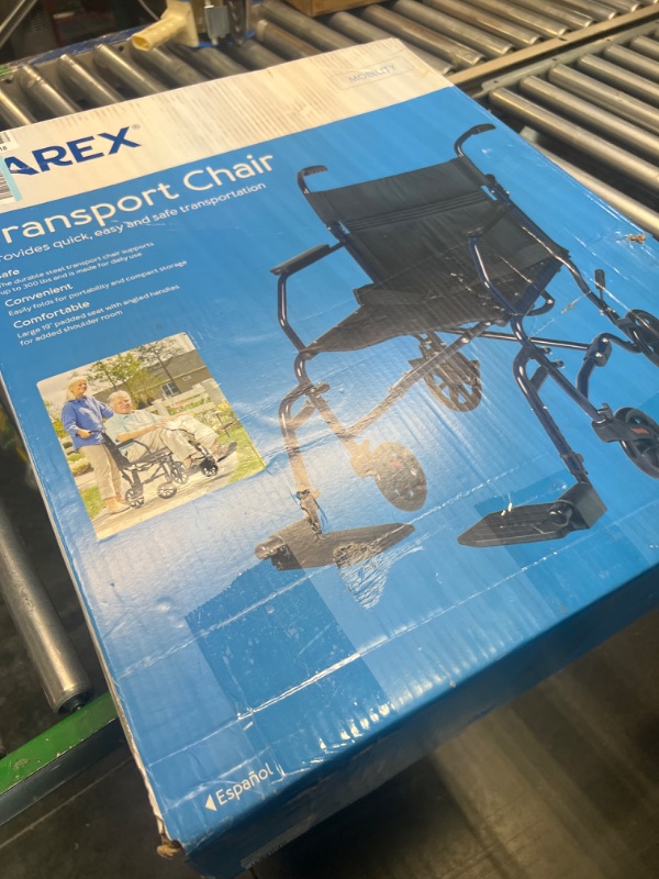Photo 1 of Carex Transport Wheelchair With 19 inch Seat - Folding Transport Chair with Foot Rests - Foldable Wheel Chair for Travel and Storage, 1 Count