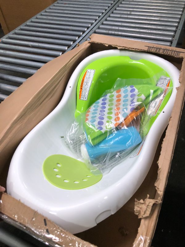 Photo 3 of Fisher-Price Baby Bath Tub, 4-in-1 Newborn to Toddler Tub with Infant Seat Bath Toys and Sling ‘n Seat Tub, Green Green - Frustration Free Package