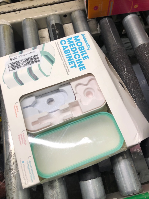 Photo 1 of ***CONTAINERS ONLY*** 

Frida Baby Mobile Medicine Cabinet Travel Kit | Portable Carrying Case Stocked with Wellness Essentials
