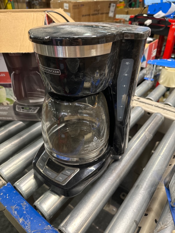 Photo 2 of *** NOT FUNCTIONAL**** SELLING AS PARTS***
 CM1160B 12-Cup Programmable Coffee Maker, Black/Stainless Steel