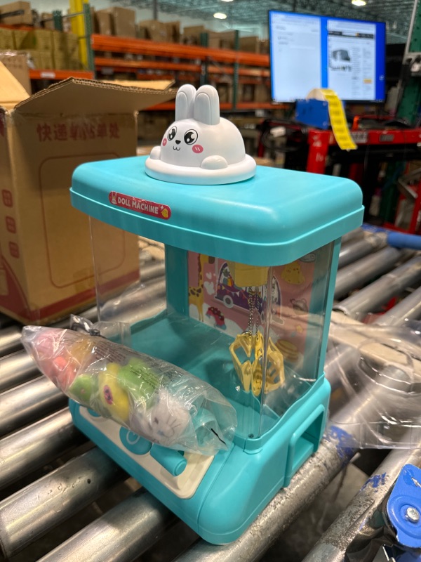 Photo 2 of ***DAMAGED***
Mini Claw Machine – Feature LED Lights Adjustable Sounds Loud Sound Effects Claw Machine Arcade Game Toy Vending Machine with10Dolls?10 Twisted Egg?USB Cable ?Best Gift Toy