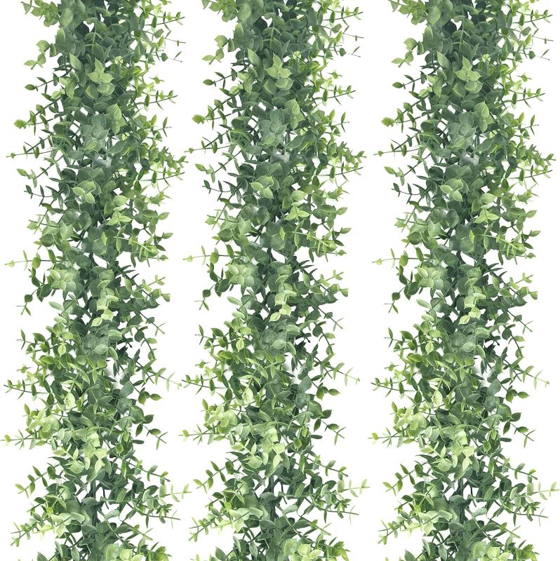 Photo 1 of 3 Pack Eucalyptus Garland Spring Artificial Greenery Garland 17.7 Ft Fake Vines Hanging Plants Faux Wedding Backdrop Arch Wall Greenery Decor for Home Wedding Party Mantle Table Decor