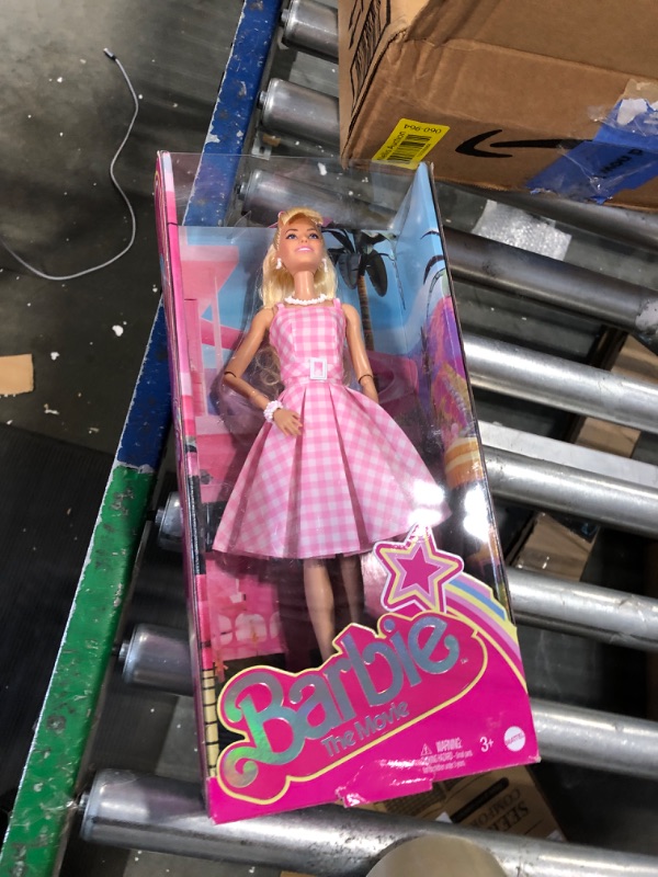 Photo 3 of Barbie The Movie Doll, Margot Robbie as Barbie, Collectible Doll Wearing Pink and White Gingham Dress with Daisy Chain Necklace