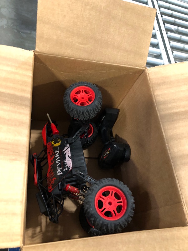 Photo 2 of CROBOLL 1:12 Large Remote Control car for Boys Girls with Upgraded Lifting Function, 4WD 20km/h RC Car Toy Gift for Kids Off-Road RC Rock Crawler, 2.4GHz RC Monster Truck for 60Mins Play(Red)