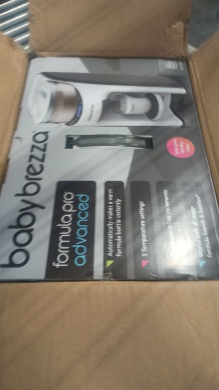 Photo 1 of New and Improved Baby Brezza Formula Pro Advanced Formula Dispenser Machine - Automatically Mix a Warm Formula Bottle Instantly - Easily Make Bottle with Automatic Powder Blending
