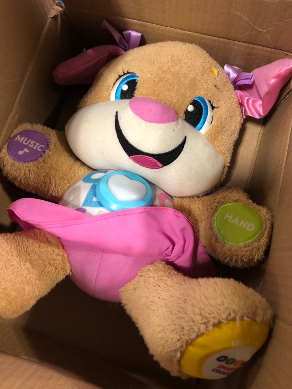 Photo 3 of Fisher-Price Laugh & Learn Baby & Toddler Toy Smart Stages Sis Plush Dog with Music Lights & Learning Content for Ages 6+ Months? 1 count Sis - Pink