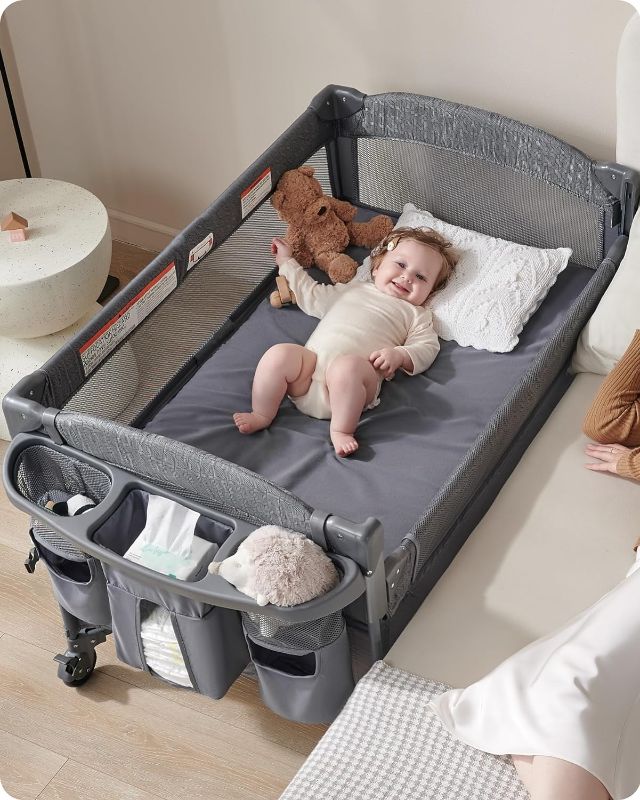 Photo 1 of Baby 4 in 1 Bassinet Bedside Sleeper, 4 Functions Bedside Crib Sleeper, Playard, Changing Table, Baby Bassinet for Newborn Baby, Bedside Bassinet for Baby Portable Changing Table