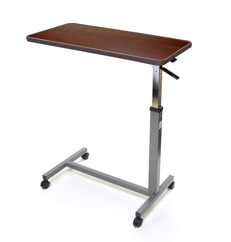 Photo 1 of Invacare 6418 Hospital Style Overbed Table with Adjustable Height Tilt Top and Wheels for Beds and Bedside, Wood Grain