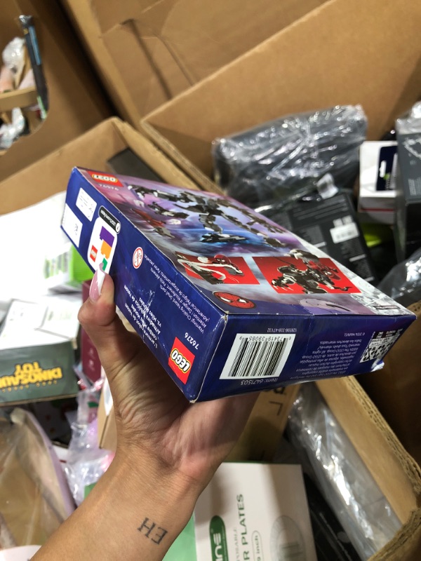 Photo 1 of Lego Marvel Venom Mech Armor vs. Miles Morales, Posable Action for Kids, Marvel Building Set with Minifigures, Travel Toy, Super Hero Battle Gift for Boys and Girls Aged 6 and Up, 76276