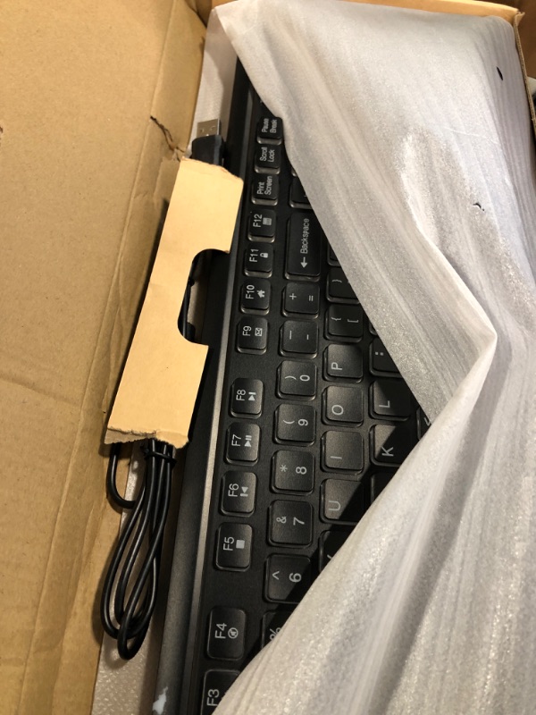Photo 1 of Fiodio Rainbow Membrane Gaming Keyboard, Quiet Wired Computer Keyboard, 104 Silent & 26 Anti-Ghosting Keys, Spill Resistant, Multimedia Control for PC and Desktop