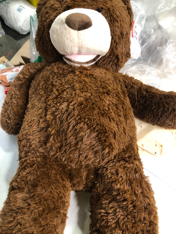 Photo 2 of DOLDOA Giant Teddy Bear Stuffed Animal 39.5in, Big Teddy Bear for Baby Shower, Large Stuffed Bear Plush for Kids, Girlfriend, Christmas, Valentines, Adorable Footprint Design, Dark Brown 39 in Dark Brown