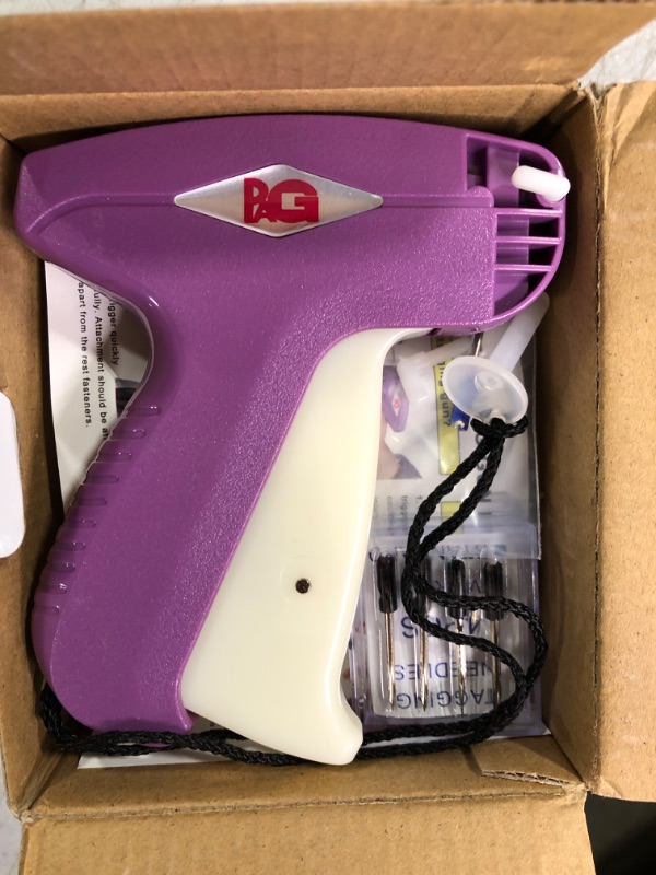 Photo 1 of PAG Standard Tagging Gun Price Tag Attacher Gun for Clothing with 5 Needles and 2000 2inch Barbs Fasteners, Purple